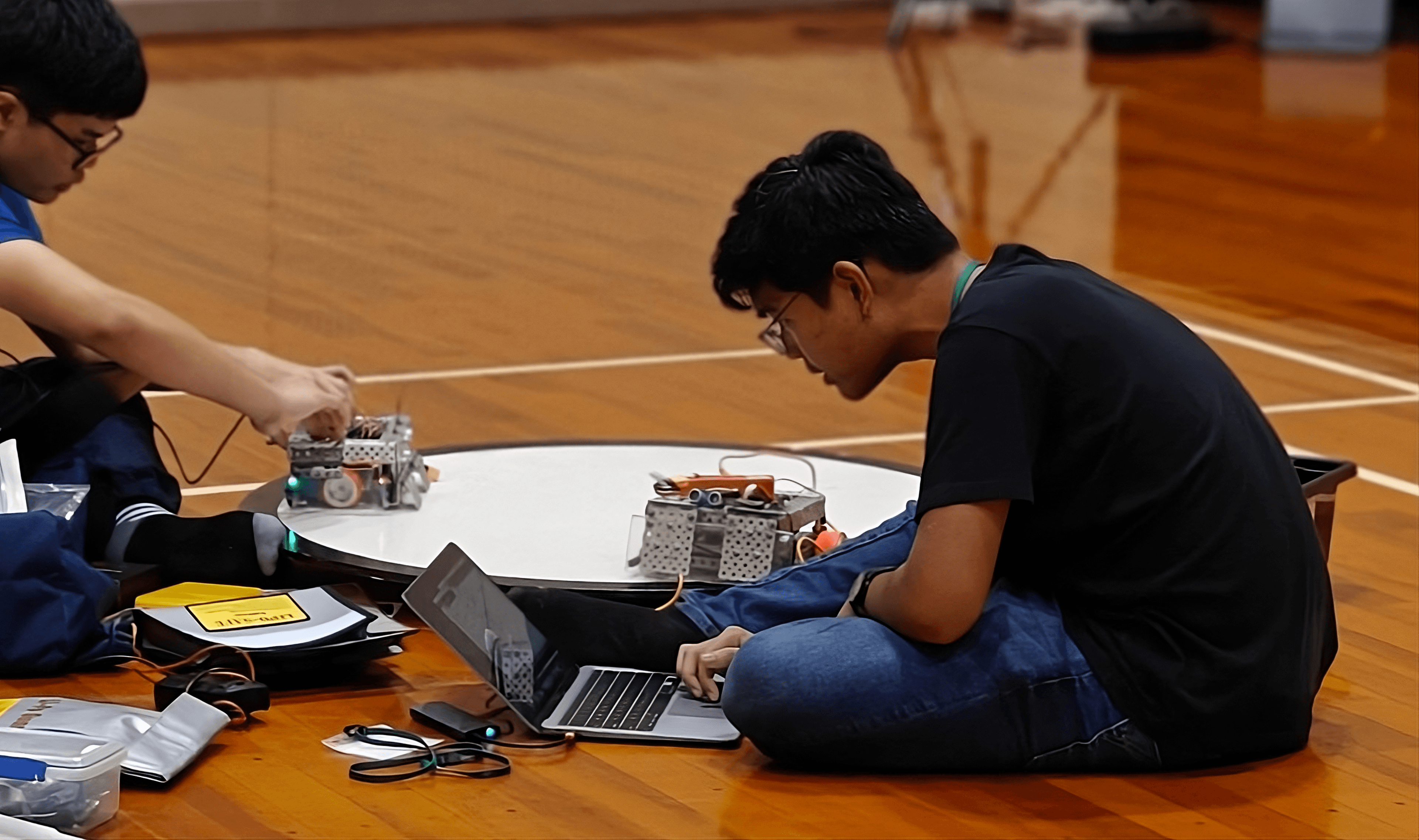 Myself working on our first sumo bot in Roborave Kaga 2023